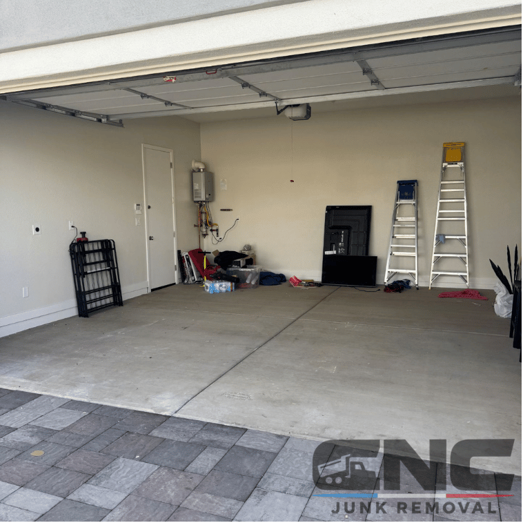 Empty, swept garage with clean concrete floor in Gilbert, AZ