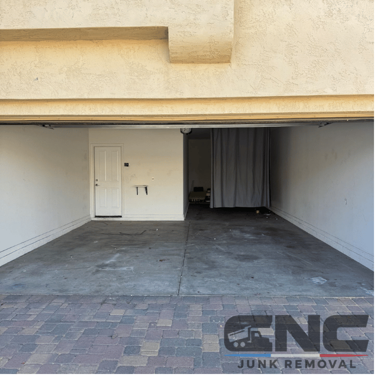 Empty, clean garage with bare concrete floor in Scottsdale, AZ