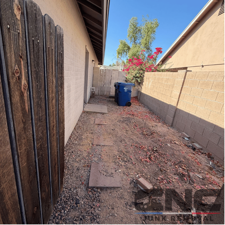 Clean, cleared side yard with swept gravel in Mesa, AZ